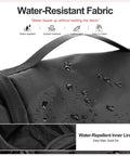 Water beading on black Hanging Toiletry Bag For Men And Women, Waterproof Nylon Dopp Kit with water-repellent fabric.