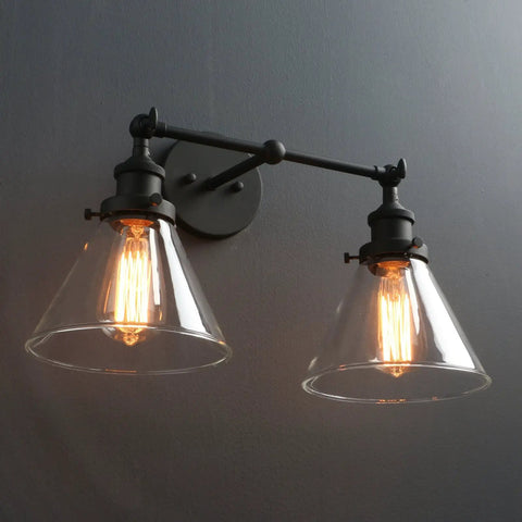 Two Light Industrial Wall Sconce In Antique Black With 7.3 Inch Cone Clear Glass Shade 180 Degree Adjustable E26 Base Compatible With LED Incandescent CFL Halogen Bulbs Bulbs Not Included Handmade Glass Lampshade