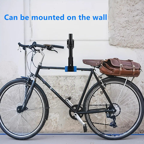 Heavy Duty Bicycle Repair Stand with bench mount, adjustable clamp, wide compatibility, steel construction, mounted on wall with bike