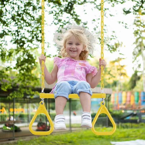 Child on yellow Backyard Trapeze Swing Bar Sixteen Point Five Inch With 47 Inch Coated Chains And Two Snap Hooks Easy Install
