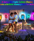 People enjoying outdoor event with Cool Multicolor Solar Torch Lights Waterproof Outdoor Path Lighting With Dancing Flame Effect