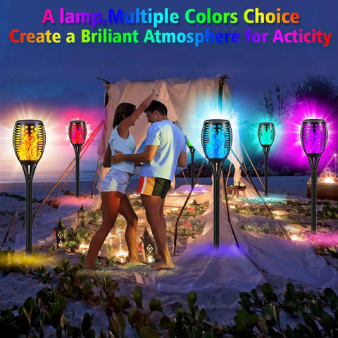 People enjoying outdoor event with Cool Multicolor Solar Torch Lights Waterproof Outdoor Path Lighting With Dancing Flame Effect