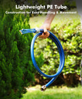 Person holding adjustable outdoor standing misters for patio cooling with four directional nozzles and six-foot flexible hose