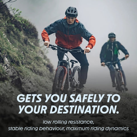 Cyclists on mountain trail using Aerothan Tube Ultra Lightweight TPU Bicycle Inner Tube For MTB Mountain Bikes Trekking Gravel Cargo And BMX Heat Resistant Pro Grade Low Rolling Resistance Rim Brake Ready Made In Germany.