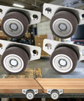 Mini Side Mount Caster Wheels Low Profile Rigid Non Swivel Rollers For Sliding Doors Drawers And Cabinets Slick Quiet Rubber Tires Smooth Rolling Solid Setup Four Pack 1.25 Inch close-up of casters on wooden surface.