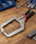 Heavy Duty Locking Clamp Plier 14 Inch With Adjustable Screw For A Beefy Non Slip Grip And Precise Holding Built For Repeated Repairs Home Improvements And Workshop Projects Delivering Fast Reliable Lockdown Power, on wood workbench