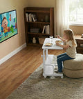 Child using Space Saver C Shaped Laptop Desk On Wheels For Small Spaces White 24 Inch Height Adjustable With 2 Tier Storage Shelves