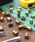 Bulk 50 Pcs M6 Barrel Nuts Kit For Cross Dowels Slotted Nuts Replacement Hardware on wood table with tools