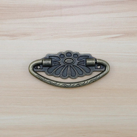Four Antique Bronze Drop Swing Drawer Pulls With Screws Drop Bail Handles for cabinets, showing zinc alloy design and rustic finish.