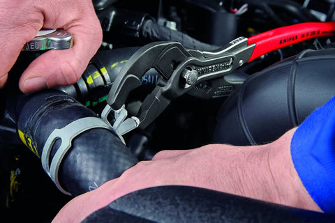 10 Inch Hose Clamp Pliers With Locking Device And Rotating Jaw Inserts For Any Angle Push Button Quick Adjustment in use on car hose