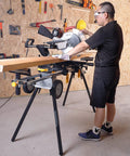 Person using Lightweight Universal Miter Saw Stand With 330 Lb Capacity, A Real Workhorse, Easy Fold, Model WK-MS050B