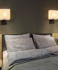 Bedroom with Dope Modern Plug In Wall Sconces Set Of 2 With USB Charging Ports And Built In AC Outlet Silver Finish With Linen Shade