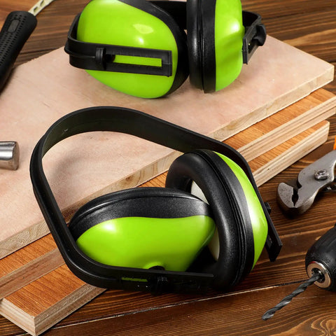 Six Piece Kids Noise Reduction Earmuffs And Hearing Protection Headphones Adjustable Padded Defender, green on wooden surface