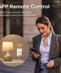 Woman using phone with lamp connected to Matter Smart Plug 2 Pack, 15A 1800W Wi Fi Outlet for remote control, indoor setting.