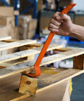 Person using 15-inch heavy duty pry bar from Two Piece Flat Pry Bar Set With Seven And A Half Inch Mini Pry Bar And Fifteen Inch Heavy Duty Nail Puller Claw Bar For DIY Kitchen Remodels Carbon Steel Corrosion Resistant Wonder Bar Prying Apart Boards on wooden pallet
