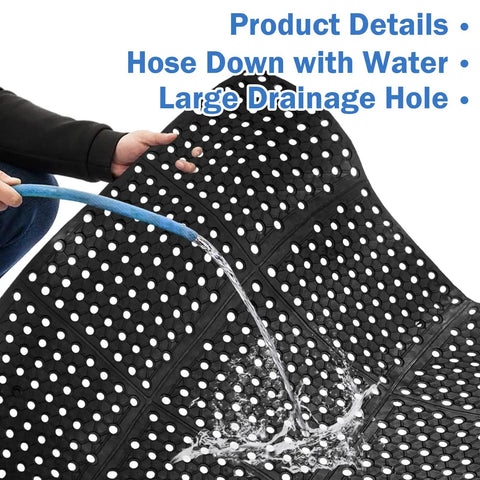 Heavy Duty Anti Fatigue Drainage Mat 82 By 35 Inch For Kitchens And Wet Areas being rinsed with water hose