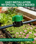 Green 1/4-inch drip irrigation shut-off valve installed in a garden setup, part of 50 Pack 1/4 Inch Drip Irrigation Shut Off Valves With Barbed Fittings For 1/4 Inch Tubing No Fuss Easy Flow Water Control For DIY Garden Drip System And Replacement Parts in use.