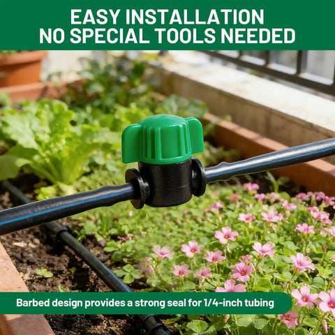 Green 1/4-inch drip irrigation shut-off valve installed in a garden setup, part of 50 Pack 1/4 Inch Drip Irrigation Shut Off Valves With Barbed Fittings For 1/4 Inch Tubing No Fuss Easy Flow Water Control For DIY Garden Drip System And Replacement Parts in use.