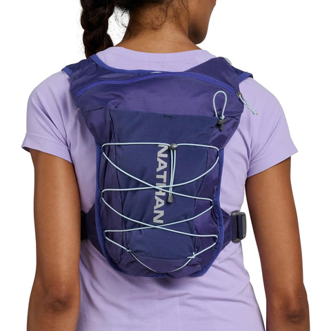 Back view of 15L Go To Hydration Pack Indigo And Reflective Silver OSFM One Size Fits Most Unisex Running Backpack worn by person