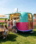 Heavy Duty Commercial Pizza Food Truck, Turnkey Mobile Catering Trailer With Built In Walk In Fridge For Side Hustle And Pop Up Stand in tulip field.