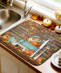 Thanksgiving Dish Drying Mat Set For Kitchen Counter, Pumpkin Harvest Maple Leaf Wood Grain Design next to sink with pumpkins