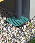 15.75 Inch Square Catch Basin With Grate And Debris Basket No Pre Cut Openings Outdoor Drain Box For Downspout Runoff Lawn Patio And Landscape Drainage Solution installed on gravel surface
