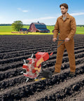 Farmer using Manual Garden Push Seeder With 7 Nozzles And Eight Pound Seed Box Easy To Use Depth Settings One To Three Inches for planting