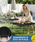Elastic Spandex Square Fitted Table Cover 34x34 Inch Two Pack Black Wrinkle Resistant Stain Resistant Durable Polyester Blend No Fuss Easy Fit For Card Folding Tables Great For Kitchen Dining Picnic Patio And Outdoor Parties installed on outdoor table