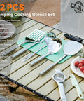 32 Piece Camping Cooking Utensil Set With Organizer Bag For Open Fire Pit And Grillin On The Go Portable RV Camp Kitchen Kit displayed on table