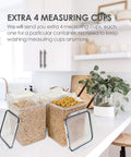 4 Pack Big Food Storage Canisters 5.2L Airtight BPA Free Plastic For Flour Sugar Rice With Lids Includes 4 Measuring Cups And 24 Labels Pantry Organization Black displayed in a modern kitchen setting.