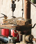 Heavy Duty 9 Inch Drill Press Locking Clamp For Precise Workholding visibly attached to a drill press, showing slot mount and quick release capabilities.