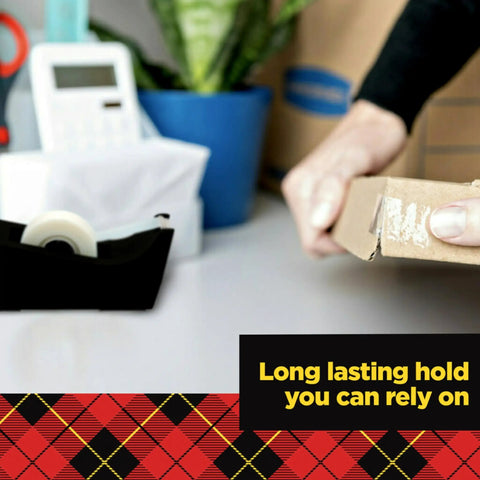 Person using glossy finish tape dispenser on desk, labeled 'Clear Portable Tape For Office And Home, Versatile Transparent Adhesive'