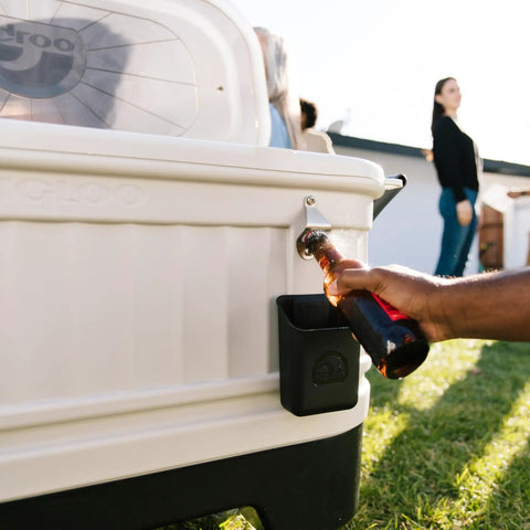 Close-up of bottle being opened with 125 Qt Gray Party Bar Wheeled Cooler with Ultratherm Insulation and beverage tub feature