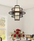 Handwoven Lotus Shaped Rattan Pendant Light With Multi Tier Bamboo Lampshade In Black 17.7 Inch Wide over dining area