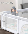 Baby in gray outfit playing inside Extra Large Baby Playpen With Mat 79 By 71 Inches For Toddlers And Infants Safety Gate Play Yard