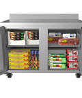 Built Tough 48 Inch Stainless Steel Commercial Worktop Freezer With Dual Doors showing stored food items and solid racks inside.