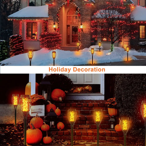 Front view of 4 Pack Solar Tiki Torch Lights With Flickering Flame IP65 Waterproof Outdoor Solar Powered Pathway Garden Yard Patio Porch Decor For Halloween And Year Round Vibe, illuminating a decorated holiday porch with pumpkins.
