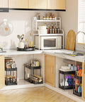 Smooth Pullout Under Sink Organizer Two Pack Heavy Duty Metal Rack For Kitchen And Bathroom Big Stack Zero Clutter Solid Setup Storage Game Changer In Black in a kitchen with full storage.