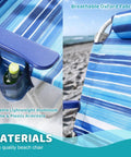 Close-up of blue Backpack Beach Chairs For Adults Half Pack Foldable Heavy Duty Camping Chair with cup holder on sandy beach.