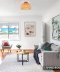 Living room with Dope Boho Rattan Semi Flush Mount Ceiling Light With Bamboo Wicker Shade Handmade Farmhouse Fixture, soft glow.