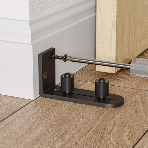 Adjustable Sliding Barn Door Floor Guide With Flat Bottom Design In Black 1 Piece Heavy Duty Steel Rail Nylon Roller installation