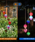 Solar Hot Air Balloon Lantern And Wind Chimes For Garden Outdoor Hanging Lights with color-changing LEDs, day and night view.