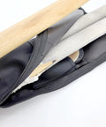 Open view of Utility Martial Arts Stick Bag For Shinai And Bokken 51 Inch Case with sticks and padded interior detail.