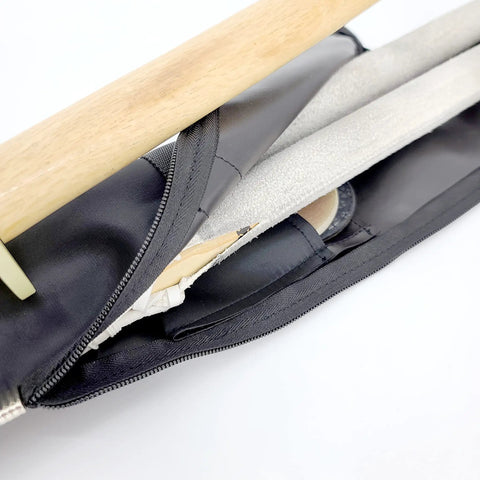 Open view of Utility Martial Arts Stick Bag For Shinai And Bokken 51 Inch Case with sticks and padded interior detail.