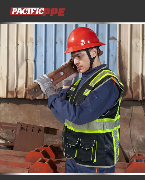 Top Notch Class 1 Black Safety Vest With Ten Roomy Cargo Pockets And 3M Reflective Straps worn by worker at a construction site.