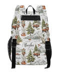 Decorative camping backpack with Alaska theme print showing lanterns, trees, cars, and mountains, front view.