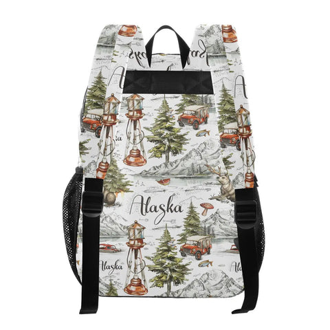 Decorative camping backpack with Alaska theme print showing lanterns, trees, cars, and mountains, front view.