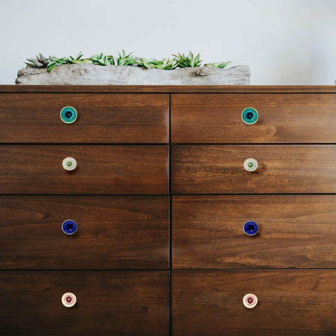 Marrakesh Mix Ceramic Cabinet Knobs Set Of 8 For Kitchen Cabinets And Furniture on wooden dresser