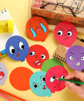 Colorful Balloon Cutouts For Classrooms And DIY Projects, 108 Assorted Hot Air Balloon Die-Cuts With 120 Glue Points on a desk