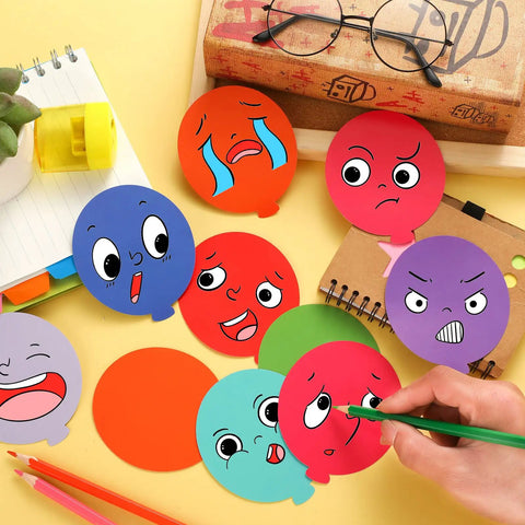 Colorful Balloon Cutouts For Classrooms And DIY Projects, 108 Assorted Hot Air Balloon Die-Cuts With 120 Glue Points on a desk